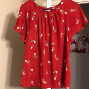Red floral blouse